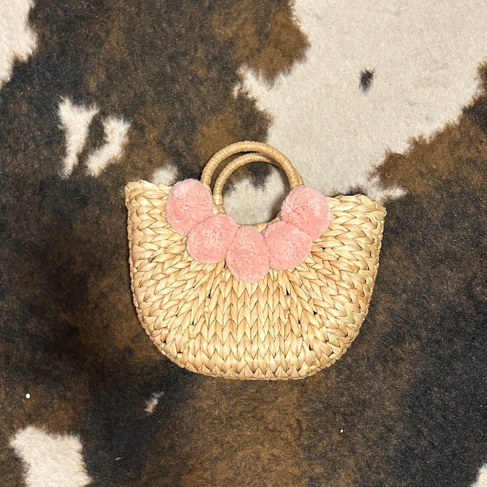 Straw Tote with Pink Pom Poms